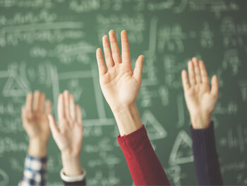 College students College hands up in the air