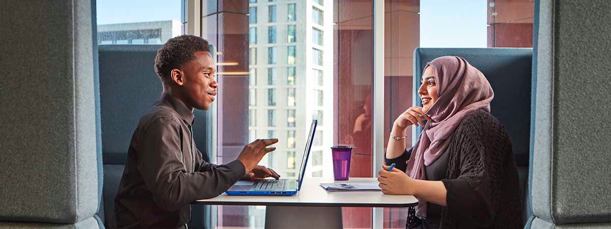 Accounting and Finance with a Foundation Year Course Image 1200x450 - Man and woman at a desk