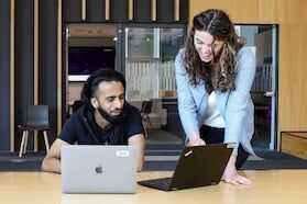 Librarian delivers a tutorial with two students