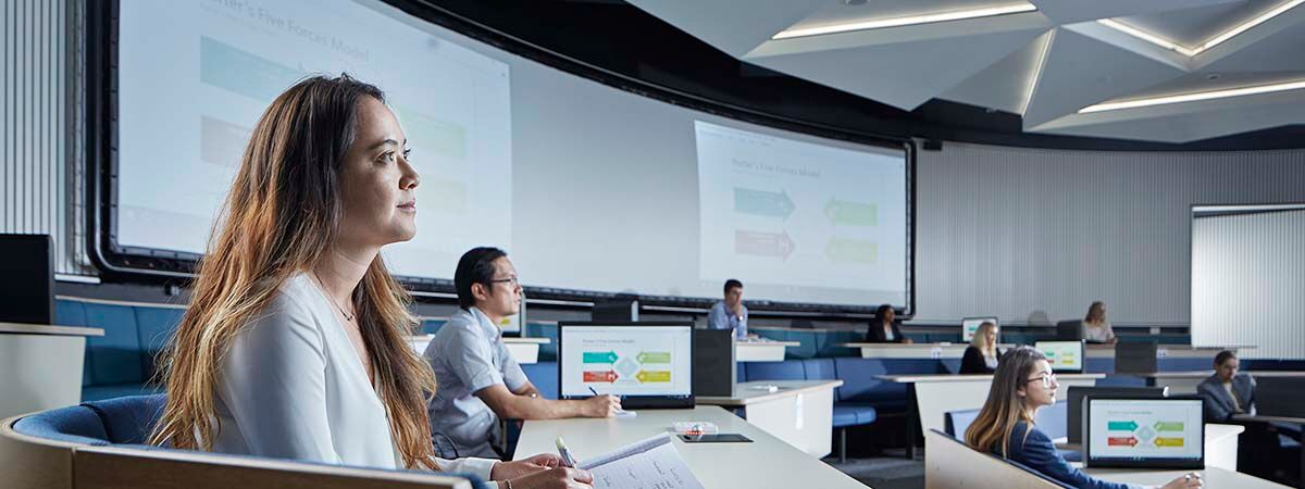 Economics Course Image 1200x450 - Men and women at a table