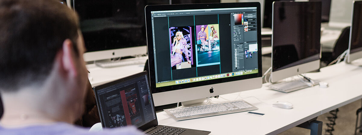 Student at computer using design software