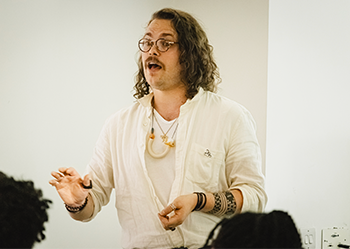 Max Wisotsky giving a talk on his research