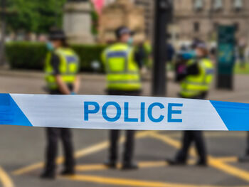 Media must avoid giving attackers publicity, says mass killings expert Crime scene with police tape