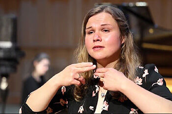 Samantha Lewis signing in British Sign Language