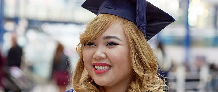 International student at graduation